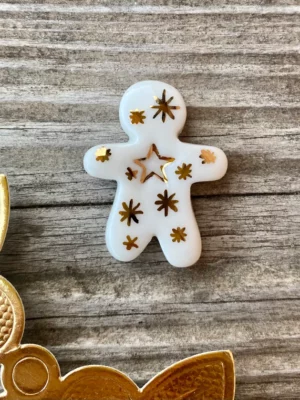 Fève manele à l’étoile d’or édition spéciale flocons de neige Noël